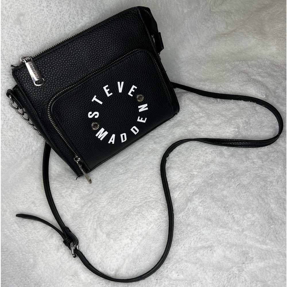 Steve Madden handbag with strap.